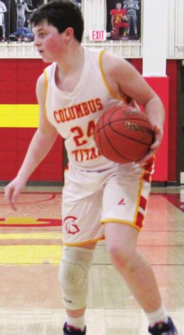Jett Tanner brings the ball down in the Central Titan 7A Team loss to St. Mary’s-Colgan, 42-14, Tuesday at the Columbus High School Gymnasium.