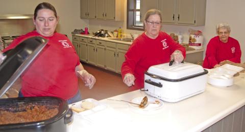 Baxter Springs Fire Auxiliary recently held a sloppy Joe fundraiser to raise money for the Baxter Springs Fire Department. Among those working were Rachel Shepard, Debbie Page and Sue Landreth.