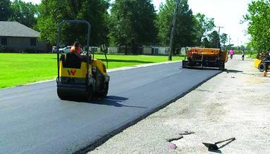 The City of Weir has given the youngsters in their community a back to school present, a newly paved street in front of the Weir Elementary school. The council members expressed their satisfaction with project at their meeting Monday night. Courtesy photo.