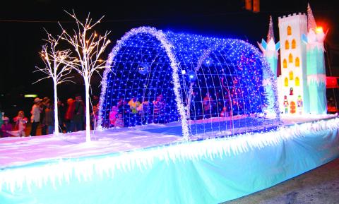Farmers Coop placed first in the business float category for their entry in the Columbus Christmas parade.