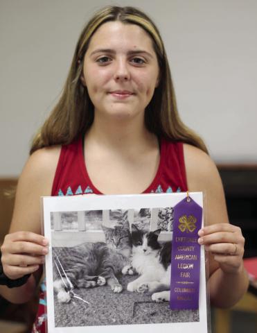 During last year’s photo class, Airauna Sharp received a purple ribbon for her kitten portrait.