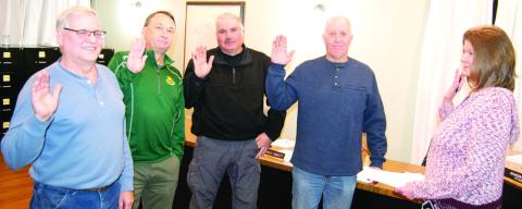 Re-elected council members were sworn in Tuesday evening during the Baxter Springs City Council meeting including Rick Chriestensen, Jody Bingham, Jimmy Younger Mayor Kelly Abbott are being sworn in by City Clerk Sharon Clark.