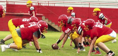 The Titan Offensive and Defensive Lines got a workout, Saturday, during the annual Lawn Chair Scrimmage at Titan Stadium. The Titans take the field for a jamboree style scrimmage, Friday at Iola.