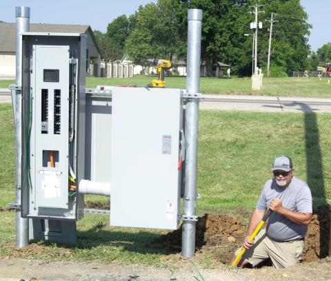 The first electric car fast charge station in Columbus was installed Thursday at the Hatfield Chevrolet dealership. The charging station was installed by Bolding Electric. Trey Bolding was working on the underground electrical connection. The stations are expected to be available for use next week.