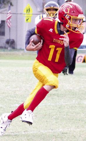 Titan Eighth Grader Levi Simpson, gains ground in the junior high eighth grade game against Parsons, September 22 at Titan Stadium. Columbus lost to Baxter Springs, Thursday, September 29, 0-14. They will host Girard, Thursday, on their home field.