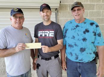 Time is rapidly drawing near for the second annual Freedom Fest sponsored by Columbus Fire Department. The event is planned for Saturday July 8 in Columbus City Park. Recently the Columbus Lions Club made a donation of $500 to the event. Lions Mark Winter and Brad Gleason presented Fire Chief Steven Burton with the check. Courtesy photo.