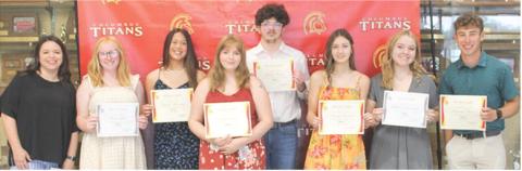 Laura Boeckman presented the Titan Cafe Scholarships to seven seniors who worked in the cafe throughout the school year and in some cases, two years as reflected in the amount of the award . Graci Hall, $800; Trinity Adoremos, $400; Emily Forkner, $400; Bobby Perry II, $400; Darcy Garrett, $400; Natalie Edmondson, $800; and Lemmie Stone, $400 each received the award during the May 15 Senior Assembly at the Columbus Unified High School Gymnasium.