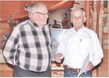 Retired manager of Big Brutus park and museum Joe Manns was presented with the coveted Miner’s Award at the corporations recent annual meeting held at Rowden’s Rustic Moose Lodge in Columbus. The award was presented by Big Brutus Board President Jim Lovell. Photo by Emmett Sullivan.