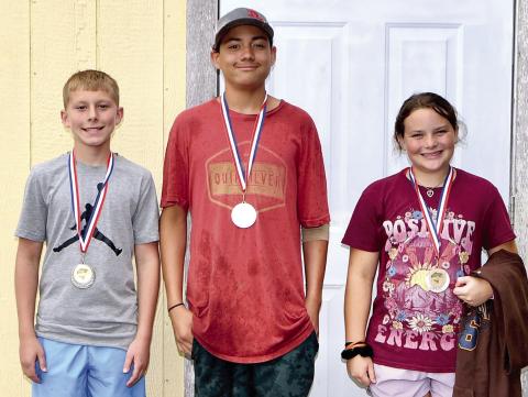 Winners in the West Mineral Eagles fishing derby ages 11-15 bass division were Tate Godfrey, first, 5.03 pounds; Marcell Nash, second, 4.32 pounds and Oakley Hamiltion, 4.03 pounds. Courtesy photo.