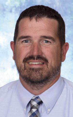Grundy named to replace Dr. Smith