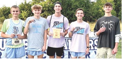 The Southeast Lancer Boys Cross Country Team earned the team title in Thursday’s home meet at the Weir Baptist Camp. Team members are James Maxton, seventh; Chris Archey, fourth; Henry Burns, 32nd; Hudson Locke, third; Tucker Sutton, second. Photo by Julie Jones.