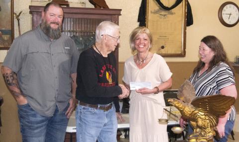 Members of the West Mineral Eagles presented Joplin Ronald McDonald House Executive Director Lori Jones with a donation check raised by the Eagles as well as several pounds of aluminum pull tabs. Presenting the check were Jim Wilson, Robert Beal, Director Jones and Crystal Beal. Jones indicated the check made her trip from Joplin worthwhile.