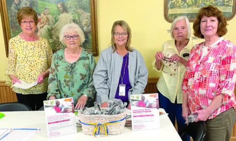 At the May 15 meeting of Cherokee County Retired School Personnel meeting, Becky Mogle, (center) from the Health Department spoke to the group about healthy eating and the various nutrition programs available locally. Pat Spriggs, Marilyn Wheatley, Mogle, Marva Holt and Rebecca Logan look over some of the literature and brochures.