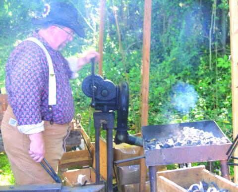 It was not uncommon for blacksmiths to accompany the army into battle as they made parts for guns, knives, swords, and other metal items for soldiers and encampments. During the recent re-enactment in Baxter Springs of Quantrill’s raid on Fort Blair Jim Friend, of Grove, Oklahoma brought his portable blacksmith shop to the battle site.