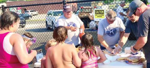 Friday afternoon, youngsters in Baxter Springs had the opportunity to swim at the new swimming pool for just $1. Kiwanis Club members hosted the event and provided free hot dogs to the children as well. Photo by Dee Riley.