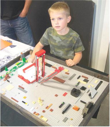 Among the exhibits at the Columbus Museum for the next few weeks will be the Lego constructed model of the “Big Muskie” dragline built by Luke Rowton. Luke said the Big Muskie was dismantled for scrap in 1999. He has also built Lego models of several other shovels including Big Brutus. His model actually works dragging the “coal bucket.”
