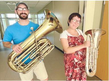 Members of the Pittsburg Community Orchestra include Jake Letner and wife Sean Gilmore. They performed yesterday and will be performing additional concerts in the future. Courtesy photo.