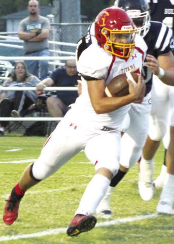 Titan Senior, Jaspen Tanner, runs around the end of the line and dives for the end zone to score the first Columbus touchdown of the night in Friday’s CNC League loss in Galena, 22-36. Tanner followed with the PAT kick and a 7-0, first quarter lead. Jaspen rushed ten times for 70 yards and was good on two of two PAT attempts.