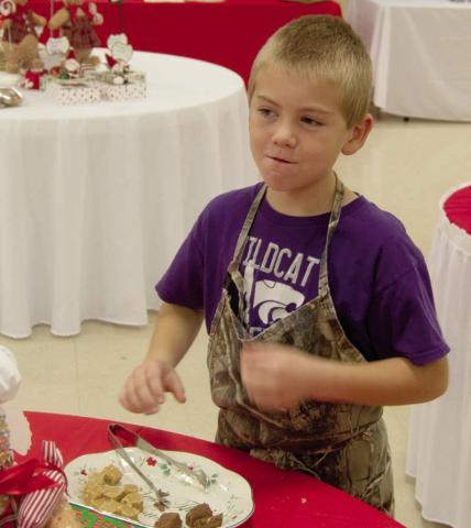 Colton Holden was checking the candy samples at the St. Bridget’s Cookie Walk on Saturday. A large early crowd took away pounds and pounds of cookies and candy made by the members of the Altar Society.