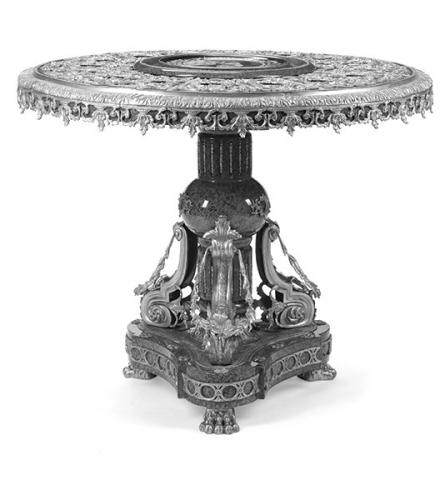This contemporary table was made in the Napoleon III style, which emerged in France about the same time as the Victorian period in England and America. Like Victorian furniture, it is known for extravagant decorations. Photo Credit: John Moran Auctioneers (c) 2025 by Cowles Syndicate Inc.