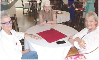 Three members of the Joplin Regional Art Coalition discuss the art show at Maple UnCommon Guesthouse and Gallery on Maple Street in Columbus. Joplin (Mo.) Globe columnist Marta Churchwell, Kim Kessel and Linda Peters are regulars at the JRAC exhibits.