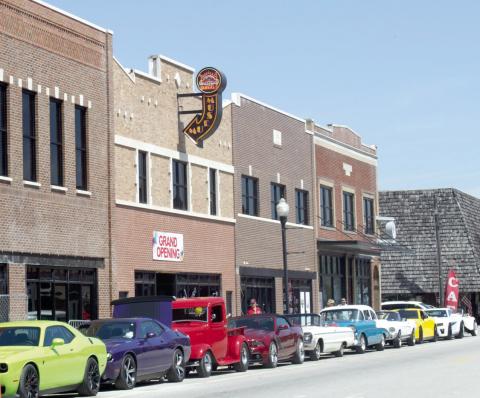 The sale of the former Decades of Wheels property comprising nearly a block of Military Avenue in Baxter Springs. The Little Brick Inn hotel is expected to reopen shortly. All the other buildings are for lease according to the owner.