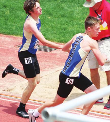 Members of the 4x800 Meter Relay Team, above: Jaxon Gantt to Dillon Leggett and below: Tyler Haywood to Michael Sheperd, exchange the baton at the KSHSAA State Class 3A Track and Field Meet, Friday in Wichita. The Ram Team placed 16th with a time of 9:11.4 minutes. Photos by Dee Riley.
