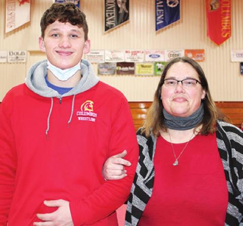 Titan Senior Osmosis Jones was recognized Friday night at the Wrestling Senior Night Ceremony in the CUHS Gymnasium. Osmosis is a four-year member of the Titan Wrestling Team. He was escorted by his mother, Crystal Ash.