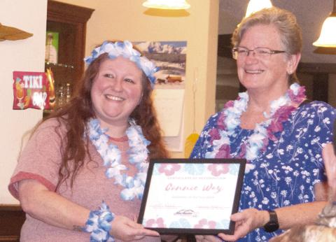 Being recognized for her efforts in the community to keep Baxter Springs beautiful, Connie Wray accepted the Chamber of Commerce award. Chamber President Jessica Moore her working throughout the city with her gardening tools in a trailer behind her lawnmower.