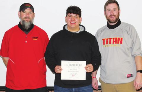 Caleb Murillo, Titan Senior Offensive Lineman,received his official invitation to play in the 2021 Kansas Shrine Bowl Football Game during recent ceremonies at the Columbus High School Gymnasium. Titan Football Head Coach, Blake Burns and assistant coach, Matt Crain were on hand for the presentation.