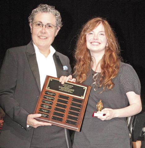 Instrumental music awards were presented at the end of year concert. Band director Gae Phillips presented Ava Hulvey with the Merle Evans Award. This is a memorial award that is presented to an outstanding senior. Merle Evans was a famous circus performer and conductor with the Ringling Brothers-Barnum Bailey Circus. He was born in Columbus.