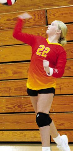 Lady Titan Eighth Grader, Landrey Perry, serves for Columbus in recent matches at the CUHS Gymnasium. The Lady Titans ended their season yesterday in the CCCJL Tournament in Frontenac.
