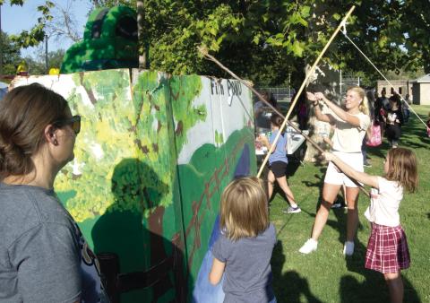 A popular game at the USD 493 Back to School Carnival was the fishing pond. Youngsters lined up for a chance to cast their line to win some fun prizes.