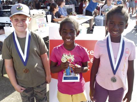 In the 7 year old division of the Pedal Tracor Pull, Jace Evans placed third with a distance of 39’1”. Sisters Kyra Lacen and Lyiah Lacen were in a tight race for the win. In their first two pulls, both girls pulled 40’. It was a battle in the third heat with Kyra pulling out the win with 33’7” over Lyiah’s 29’9” distance.