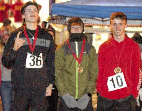 Titan Band had their annual Zombie 5K Saturday, October 28. Winners in the boys age 19 and under division were Derek Krause, first place; third place Easton Long and second place, Levi Simpson.