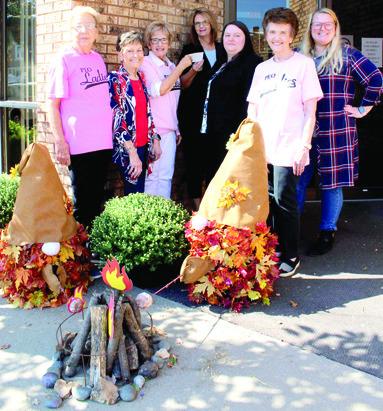 American Bank was the second place winner in the PEO fall decorating contest. Delores Crane, Judy Hill, DeAnn Binns, Sarah Lynn Thompson, Sarah Thompson, Hailey Carver and Kathryn Aupperle were on hand when the prize was presented. Courtesy photo.