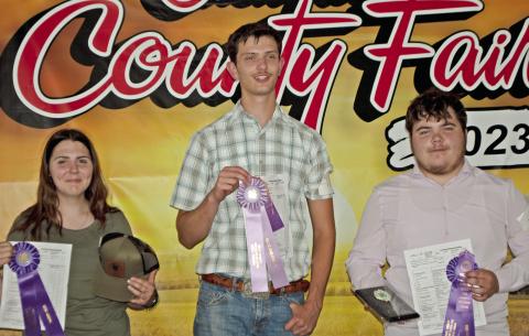 The 4-H dog show was held Tuesday of Fair Week. Airauna Sharp received Grand Champion in intermediate showmanship. Michael Shepard was Reserve Champion in Senior Showmanship and Charles Sharp was Grand Champion in Senior Showmanship. Photo by Destynne Goff.