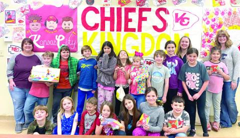 The Columbus Highland afterschool program with Kandice Ediger, Julie Thomas, and Kate Fluckiger from Cherokee County K-State Research and Extension. The program received a physical activity bundle after completing a six week nutrition and physical activity class. Courtesy photo.