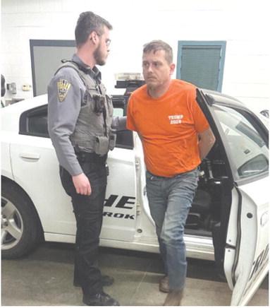 Sheriff’s Deputy Evan Duckett escorts Brian Stewart into the Cherokee County Jail after Stewart was found guilty of sex crimes.