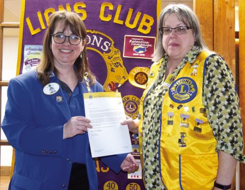 Lions District Governor Lori Horton presented Columbus Lion Janet Lindsey with her 20 year pin as a member of Lions International. The presentation was made during the Columbus Lions Club meeting Monday night. Janet said she became a Lion when the Kiwanis Club closed and four members joined the Lions. Gov. Horton said she was impressed by the local clubs activities.