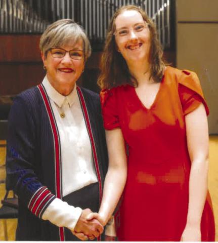Kansas Governor Laura Kelly congratulates Riverton High School graduate Bethany Hilderbrand on being a 2025 Kansas Governror’s Scholar. Courtesy photo.
