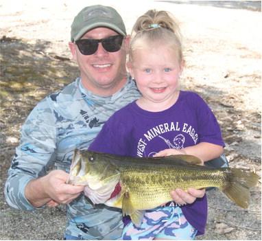 Kaydence Babcock shows the winner of the “Big Fish” catch at Saturday’s Cherokee County Sportsman’s annual fishing contest. The 4.96 pound bass was taken from a strip pit. Kaydence also had a 4.22 pound bass and she brought in 14.58 pounds of bass in just a couple of hours fishing.
