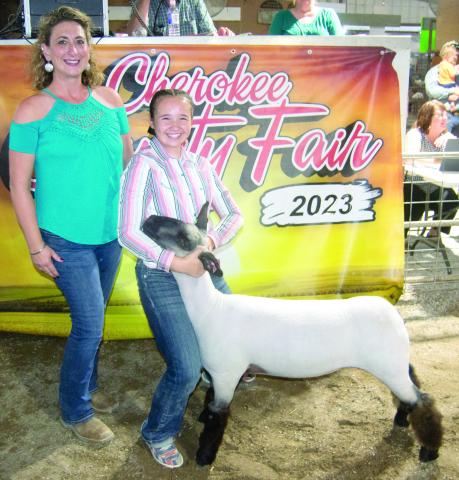 The Grand Champion Sheep and the 2023 Cherokee County Fair was shown by Kynlee Sommer, a member of the Spring Valley Sparklers 4-H Club. She received a premium of $1,200 from Sally Davis Real Estate. There were nine sheep in the sale and they drew a premium of $8,500.