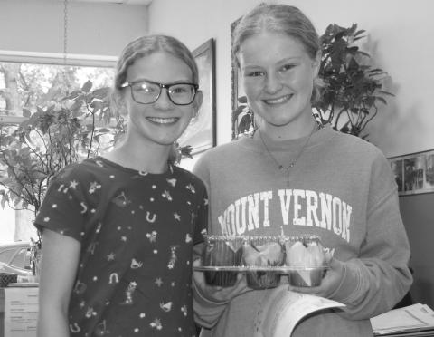 Cherokee County 4-H members recently delivered homemade treats to area businesses to show their appreciation. Ryleigh Holmes and Reagan Holmes with Glittering Stones club were among those delivering.