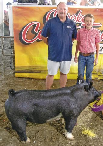 Repeating for a third year in a row Lone Elm Beaver 4-H Club member Jaxon Harper, son of Hazen and Madalyn Hale and Steven Harper took the grand champion into the ring. He received a premium of $2,200 from Jay Hatfield Chevrolet for this year’s efforts.