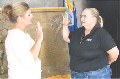 Newly elected Treasurer Heather Sapp was sworn in Monday morning by County Clerk Rebecca Brassart Monday morning after receiving the official appointment by Gov. Laura Kelly was received. She was selected by the Republican Central Committee to serve out the unfinished term of former treasurer Raven Youngblood.