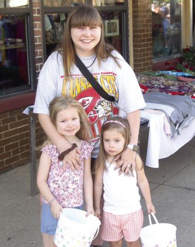 Attending the Columbus High School Homecoming parade were Claudia, Ariana and Gloria Martocei. They were part of the large crowd awaiting the parade to start.