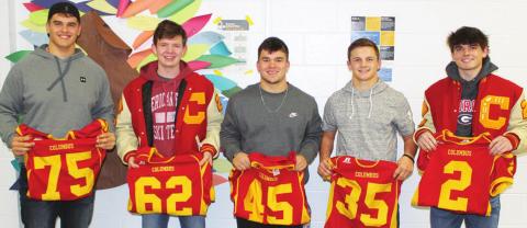 Titan Seniors, Kody Schalk, Nathan Stice, Gabe Martin, Trent Smith, and Jaxson Haraughty were recognized and presented with their jersey during the 2021 Titan Football Awards Ceremony, Wednesday, at the Columbus High School Cafeteria. The five seniors accounted for 52 percent of the Titan scoring, 42 percent of the total team tackles, 83 percent of yards rushed, and 68 percent of the team’s tackles for loss.