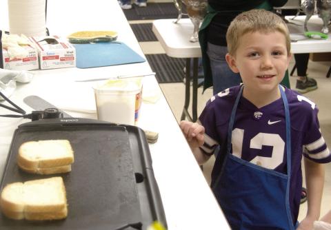 As the Easter Holiday season nears, and with the beginning of lent, the annual Saint Bridget’s Catholic Church Friday Fish Fry was held in the Scammon Parish Hall. Some folks who don’t eat fish such as Luke Holden go for the grilled cheese sandwiches and a side or two.
