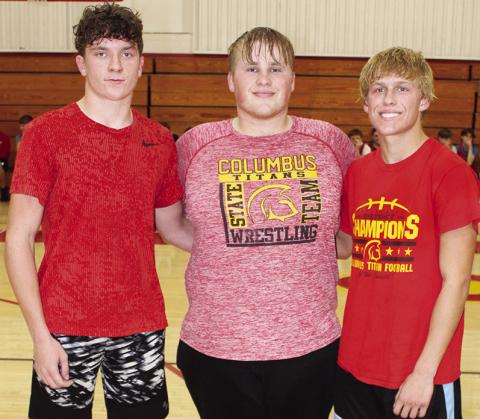 Senior members of the Titan Wrestling Team were introduced during the Meet the Titans Night at the Columbus Unified High School Gymnasium, November 28. Kayden Cox, Jake Eddington, and Cade Saporito.
